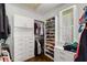 Organized walk-in closet with custom shelving and drawers, optimizing space and storage solutions at 980 Faith Se Ave, Atlanta, GA 30316