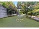 Enjoy this beautifully landscaped dog park, complete with shady seating areas and astroturf play area at 980 Faith Se Ave, Atlanta, GA 30316