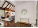 Welcoming foyer featuring hardwood floors, a modern console table, and an arched doorway at 980 Faith Se Ave, Atlanta, GA 30316