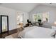 Primary bedroom with ensuite bathroom access and large window views at 980 Faith Se Ave, Atlanta, GA 30316