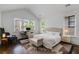 Primary bedroom features a vaulted ceiling, natural light from windows, and work from home desk at 980 Faith Se Ave, Atlanta, GA 30316