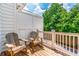Relaxing deck with rocking chairs and a view of the green foliage at 1964 Attell Way, Decatur, GA 30033