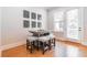 Cozy dining area featuring a unique table with cushioned stools and stylish wall decor at 1964 Attell Way, Decatur, GA 30033