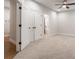 Empty room with neutral carpet and adjoining bathroom space at 1964 Attell Way, Decatur, GA 30033