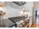 Gourmet kitchen featuring granite countertops, stainless steel appliances, and a stylish backsplash at 1964 Attell Way, Decatur, GA 30033