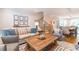 Inviting living room with comfortable seating, wooden coffee table, and staircase at 1964 Attell Way, Decatur, GA 30033