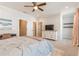 Spacious main bedroom with a ceiling fan and large bed near white dresser at 1964 Attell Way, Decatur, GA 30033