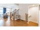 Elegant staircase with wooden rails and an open view of the living area at 1964 Attell Way, Decatur, GA 30033