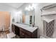 Bright bathroom features a double vanity with chrome fixtures and plenty of counter space at 5525 Sable Way, Atlanta, GA 30349