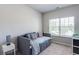 Bedroom showcasing a daybed with comfortable pillows and a window at 5525 Sable Way, Atlanta, GA 30349