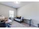 Office space with neutral walls, plush carpet, and a window for natural light at 5525 Sable Way, Atlanta, GA 30349