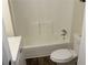 Bathroom featuring toilet and bathtub at 5561 Petite Pt, Lithonia, GA 30058