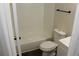 Cozy bathroom features a sleek white bathtub and a coordinating toilet at 5561 Petite Pt, Lithonia, GA 30058