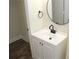 Bathroom featuring vanity, mirror and a towel ring at 5561 Petite Pt, Lithonia, GA 30058