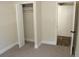 Bedroom featuring carpet and a closet at 5561 Petite Pt, Lithonia, GA 30058