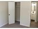 This bedroom features new carpet, a walk-in closet, and an ensuite bathroom at 5561 Petite Pt, Lithonia, GA 30058