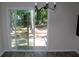 Dining room with sliding glass doors that provide a view of the backyard at 5561 Petite Pt, Lithonia, GA 30058