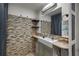 Bathroom showcasing mosaic tile accent wall, vessel sink, and modern fixtures at 6980 Roswell Rd # B13, Sandy Springs, GA 30328