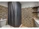 Bathroom showcasing mosaic tile accent wall, walk in shower and modern fixtures at 6980 Roswell Rd # B13, Sandy Springs, GA 30328