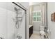 Bathroom features tile flooring, white subway-tiled shower, and window with natural light at 205 3Rd Street Northeast Ne St # 4, Atlanta, GA 30308
