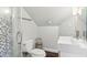 Bathroom featuring a glass shower enclosure, tiled walls, and modern white vanity at 205 3Rd Street Northeast Ne St # 4, Atlanta, GA 30308
