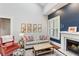 Charming living room with natural light, fireplace, and beautifully decorated space at 205 3Rd Street Northeast Ne St # 4, Atlanta, GA 30308