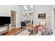 Open-concept living room with soaring skylights and elegant hardwood floors at 205 3Rd Street Northeast Ne St # 4, Atlanta, GA 30308
