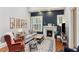 Comfortable living room featuring a decorative fireplace, hardwood floors, and elegant decor at 205 3Rd Street Northeast Ne St # 4, Atlanta, GA 30308