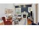 Elegant living room featuring a fireplace, hardwood flooring, and stylish decor at 205 3Rd Street Northeast Ne St # 4, Atlanta, GA 30308
