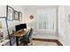 Office space with a window for natural light, wooden floors, and computer set up at 205 3Rd Street Northeast Ne St # 4, Atlanta, GA 30308