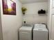 Functional laundry room equipped with a modern washer and dryer at 3505 Saddle Creek Ln, Ellenwood, GA 30294