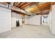Unfinished basement with exposed beams and ductwork, offering potential for customization at 997 Thousand Oaks Nw Bnd, Kennesaw, GA 30152