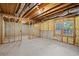 Unfinished basement with exposed beams and framing, offering customization opportunities at 997 Thousand Oaks Nw Bnd, Kennesaw, GA 30152