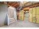 Unfinished basement with staircase and exposed framework, ready for your personal design at 997 Thousand Oaks Nw Bnd, Kennesaw, GA 30152