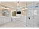 Bright bathroom features dual vanities, a soaking tub, and a separate glass-enclosed shower at 997 Thousand Oaks Nw Bnd, Kennesaw, GA 30152