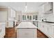 Spacious kitchen featuring an island, stainless steel appliances, and ample counter space with bright natural light at 997 Thousand Oaks Nw Bnd, Kennesaw, GA 30152