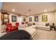Inviting home theater with comfortable seating, projector, movie posters, and bean bag chair at 3589 Tamerton Trce, Buford, GA 30519