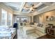 Spacious living room boasts large windows, neutral décor and an open floor plan at 3589 Tamerton Trce, Buford, GA 30519