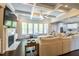 Bright living room features fireplace, coffered ceiling, and plenty of natural light at 3589 Tamerton Trce, Buford, GA 30519
