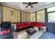 Relaxing sunroom with comfortable seating and views of trees at 3589 Tamerton Trce, Buford, GA 30519