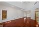 Bright living room with hardwood floors, high ceilings, and a large window, creating an inviting atmosphere at 1025 Whitfield Ct, Smyrna, GA 30080