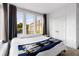 Inviting bedroom with large windows offering neighborhood views at 395 Pratt Drive Se # No 802, Atlanta, GA 30315
