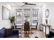 Stylish dining area featuring a sleek table, comfortable chairs, hardwood floors, and abundant natural light at 395 Pratt Drive Se # No 802, Atlanta, GA 30315