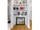 Hallway with custom shelving, modern decor, and doorway to bathroom at 395 Pratt Drive Se # No 802, Atlanta, GA 30315