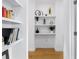 Bright shelving displaying decoratives and books that compliment the wood floors at 395 Pratt Drive Se # No 802, Atlanta, GA 30315