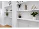 Custom shelving units with decorative items, enhancing the home's aesthetic appeal at 395 Pratt Drive Se # No 802, Atlanta, GA 30315