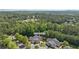 Aerial view of a home community surrounded by mature trees and wooded views at 5336 Stone Village Nw Cir # 2, Kennesaw, GA 30152