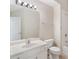 Bathroom with white vanity, toilet, mirror, and shower at 5336 Stone Village Nw Cir # 2, Kennesaw, GA 30152