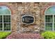 Stonebrook Village community sign surrounded by manicured landscaping at 5336 Stone Village Nw Cir # 2, Kennesaw, GA 30152