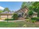 Attractive home with stone and siding accents, complemented by mature trees and manicured lawn at 5336 Stone Village Nw Cir # 2, Kennesaw, GA 30152